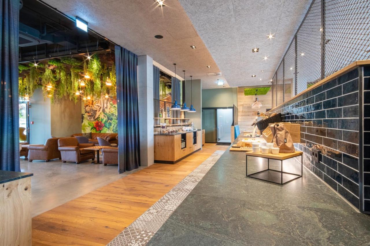 Riku Hotel รอยท์ลิงเงน ภายนอก รูปภาพ